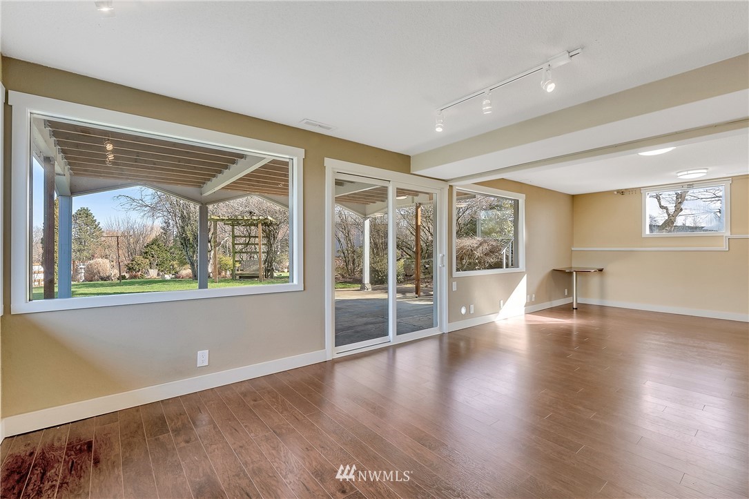 5874 Laurel Ridge Way Bellingham, WA 98226 - Photo 29 of 40 a view of empty room with wooden floor and fan