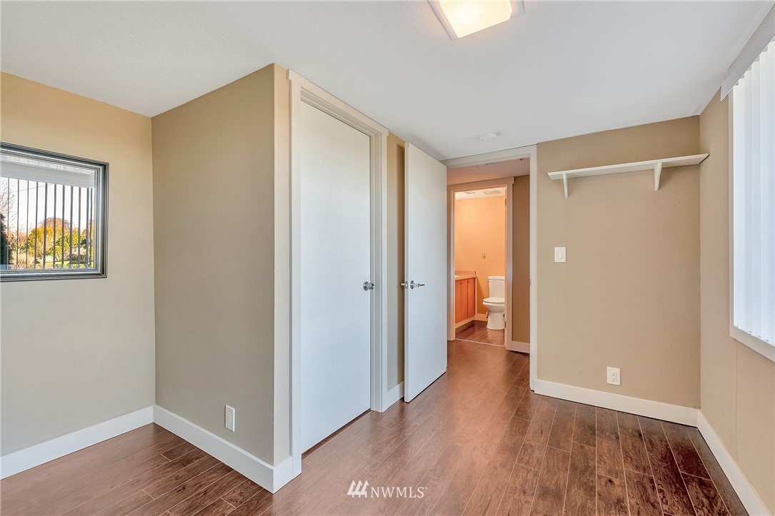 5874 Laurel Ridge Way Bellingham, WA 98226 - Photo 30 of 40 a view of an empty room with wooden floor and a window