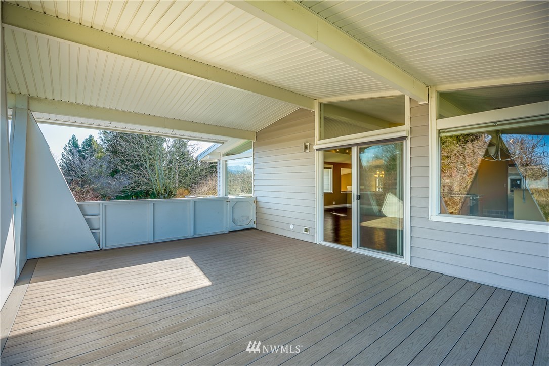 5874 Laurel Ridge Way Bellingham, WA 98226 - Photo 32 of 40 a view of an empty room with wooden floor and a window