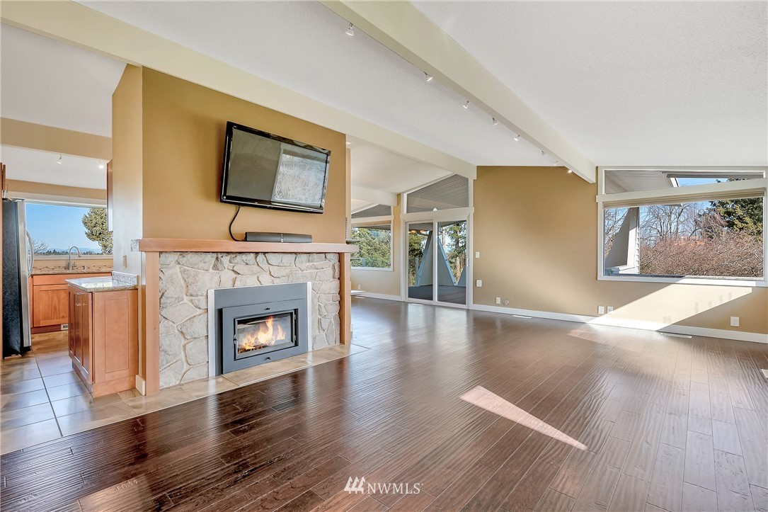 5874 Laurel Ridge Way Bellingham, WA 98226 - Photo 8 of 40 a living room with furniture fireplace and wooden floor