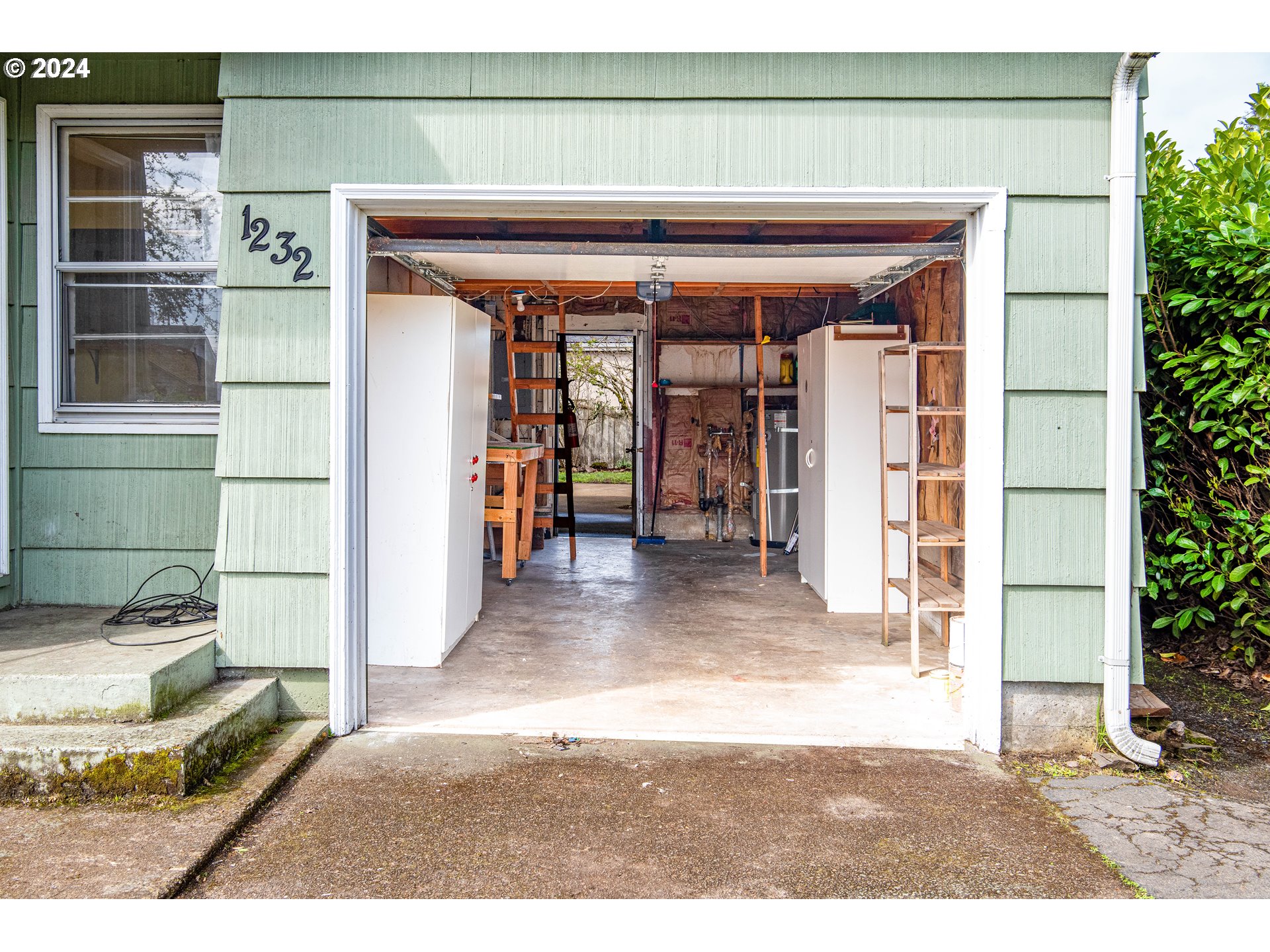 1232 8th Street Springfield, OR 97477 - Photo 6 of 19 a view of a entryway front of a house