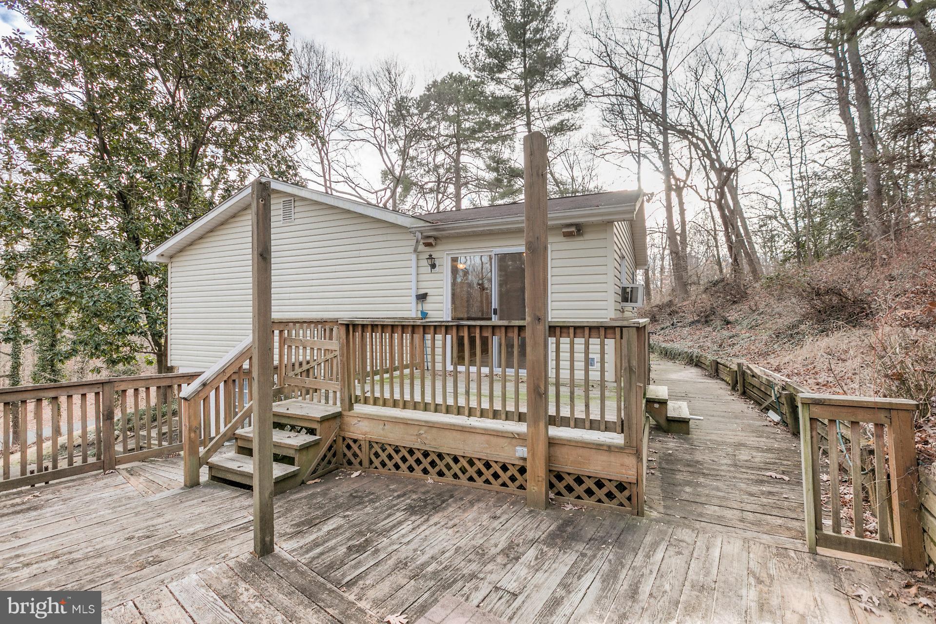 5974 Hillside Road St. Leonard, MD 20685 - Photo 2 of 28 Walkway runs along the entire rear!