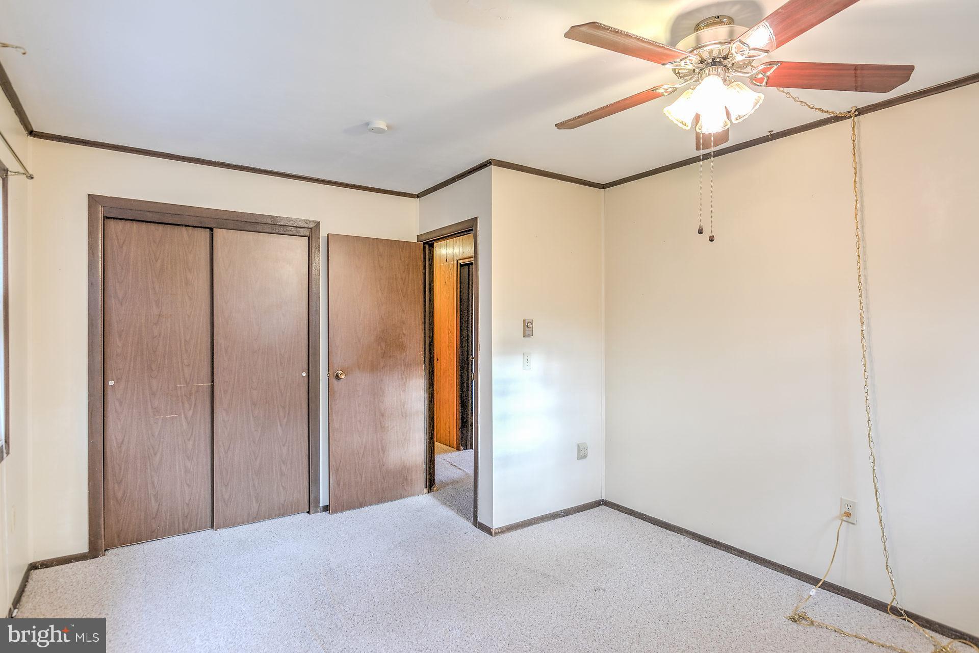 5974 Hillside Road St. Leonard, MD 20685 - Photo 16 of 28 One of three main level bedrooms.