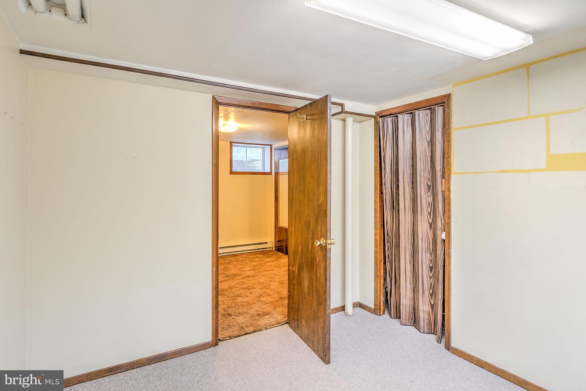 5974 Hillside Road St. Leonard, MD 20685 - Photo 22 of 28 Lower lever bedroom is very private.