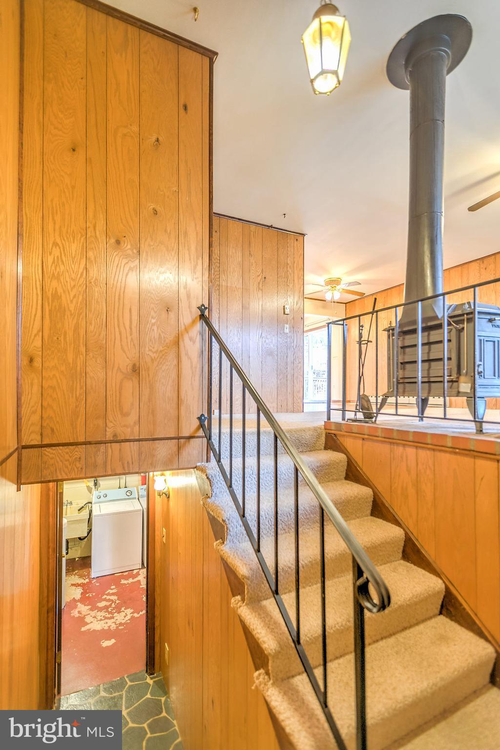5974 Hillside Road St. Leonard, MD 20685 - Photo 7 of 28 Wide stairs and open rails, nice feel!