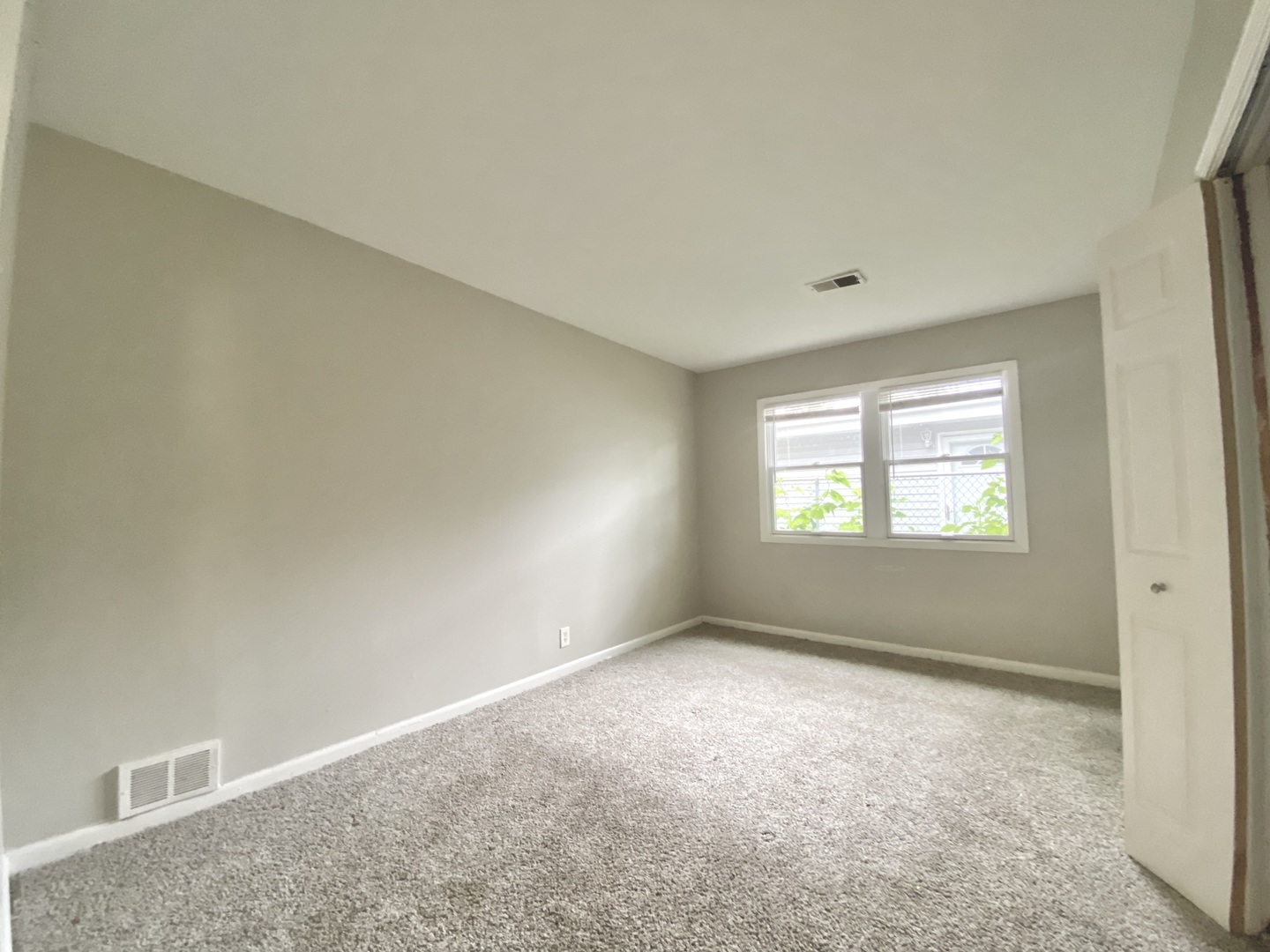 18747 Sherman Street Lansing, IL 60438 - Photo 16 of 20 a view of an empty room with a window