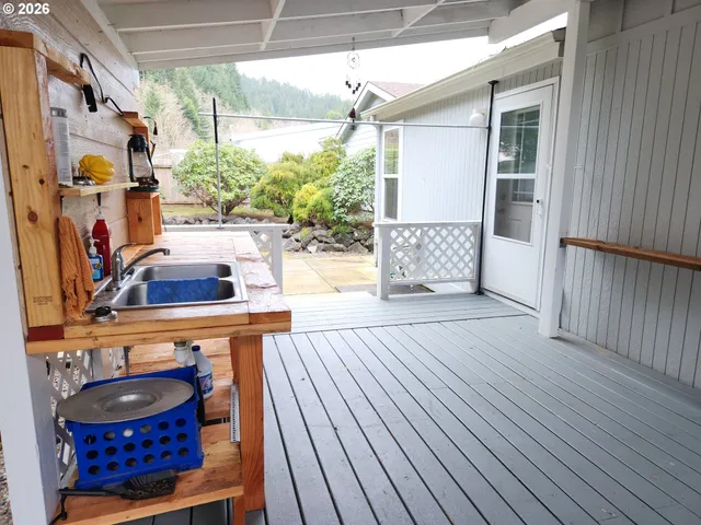 a view of a backyard with sitting area