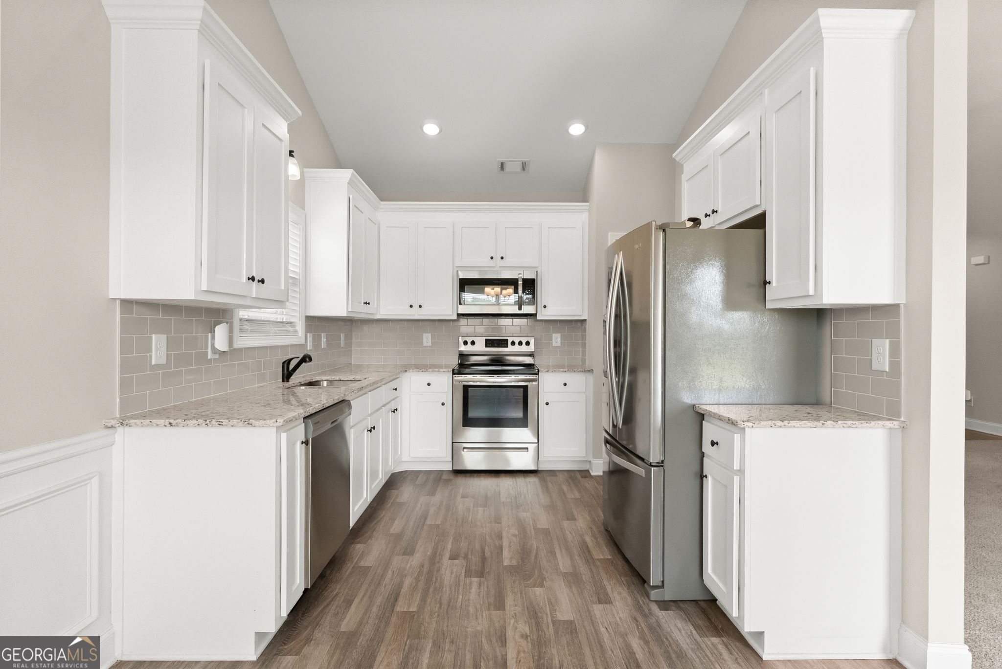 810 Anderson Thomas Road Martin, GA 30557 - Photo 12 of 40 a kitchen with stainless steel appliances a refrigerator stove and sink