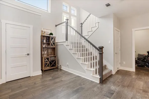 a view of entryway with stairs and furniture