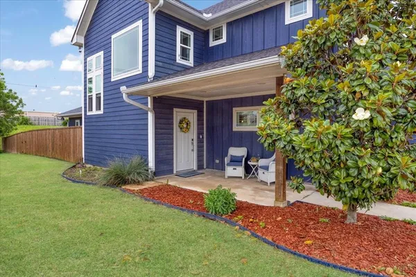 a house view with a garden space