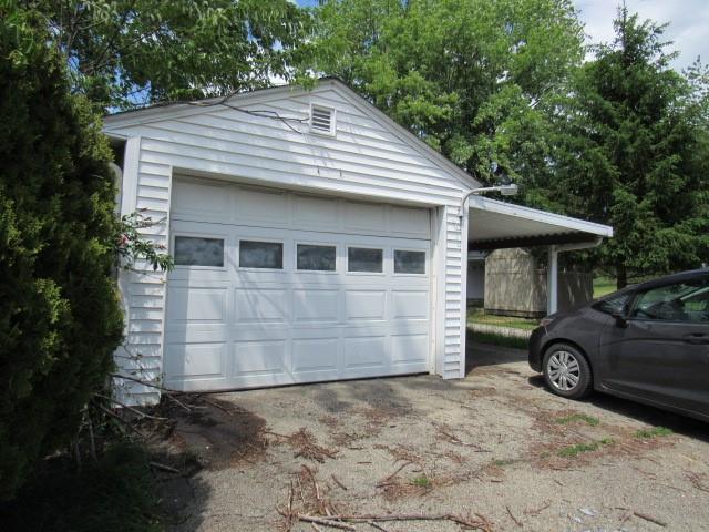 1052 North Eighty Eight Road Rices Landing, PA 15357 - Photo 17 of 24 a front view of a house with a garden