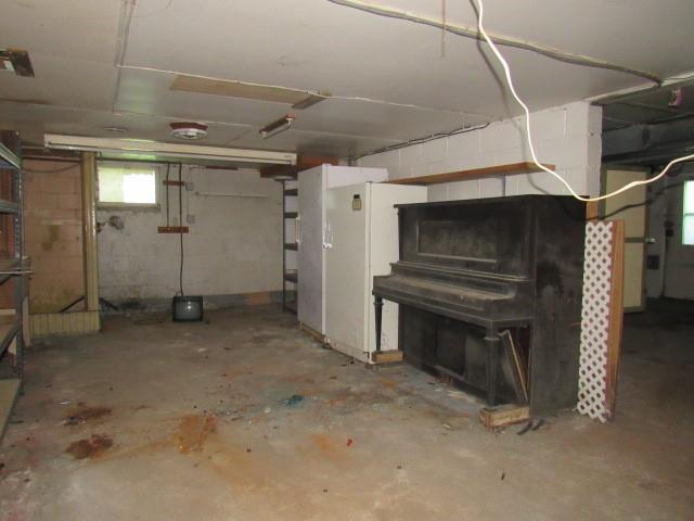 1052 North Eighty Eight Road Rices Landing, PA 15357 - Photo 21 of 24 a view of an empty room with a fireplace