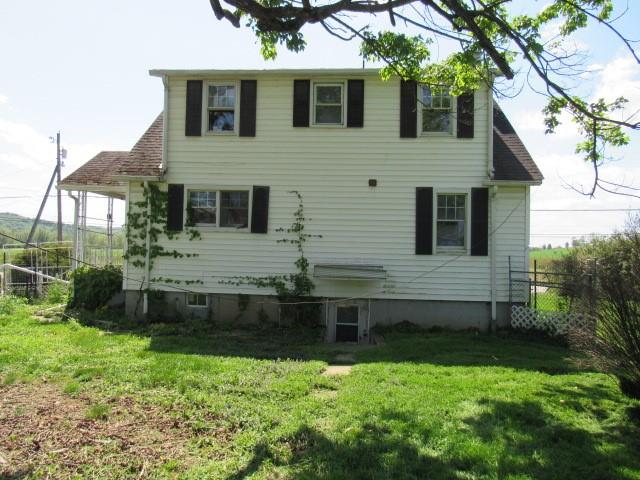1052 North Eighty Eight Road Rices Landing, PA 15357 - Photo 3 of 24 a front view of a house with a yard