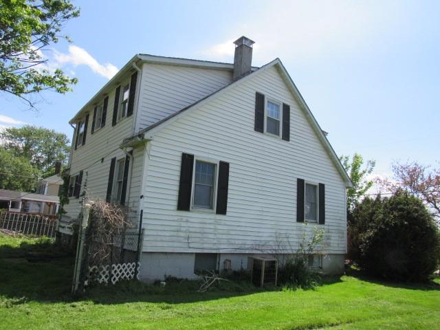 1052 North Eighty Eight Road Rices Landing, PA 15357 - Photo 5 of 24 a front view of a house with garden