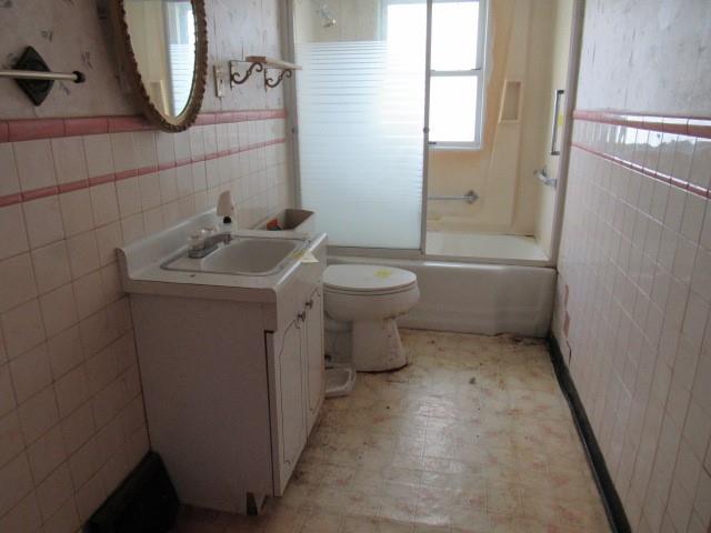 1052 North Eighty Eight Road Rices Landing, PA 15357 - Photo 10 of 24 a bathroom with a sink toilet and shower