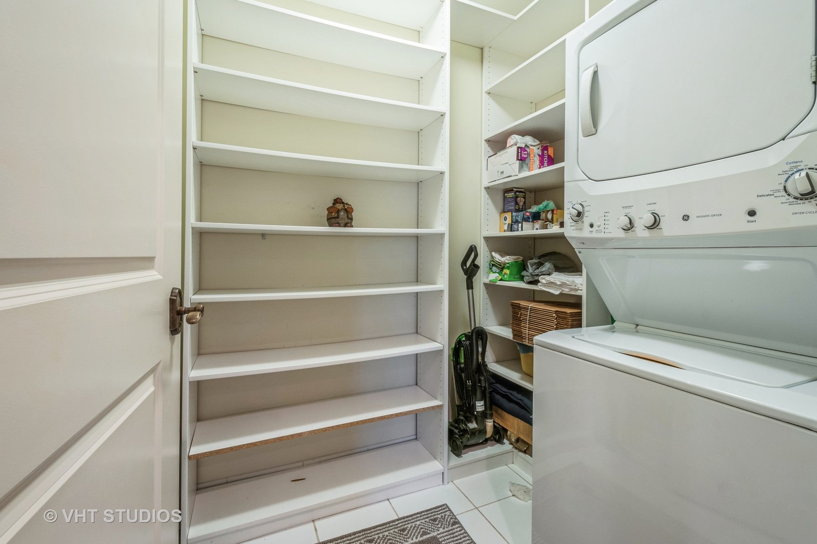 1041 Ridge Road, Unit 101 Wilmette, IL 60091 - Photo 13 of 14 a view of walk in closet with clothes and shoes