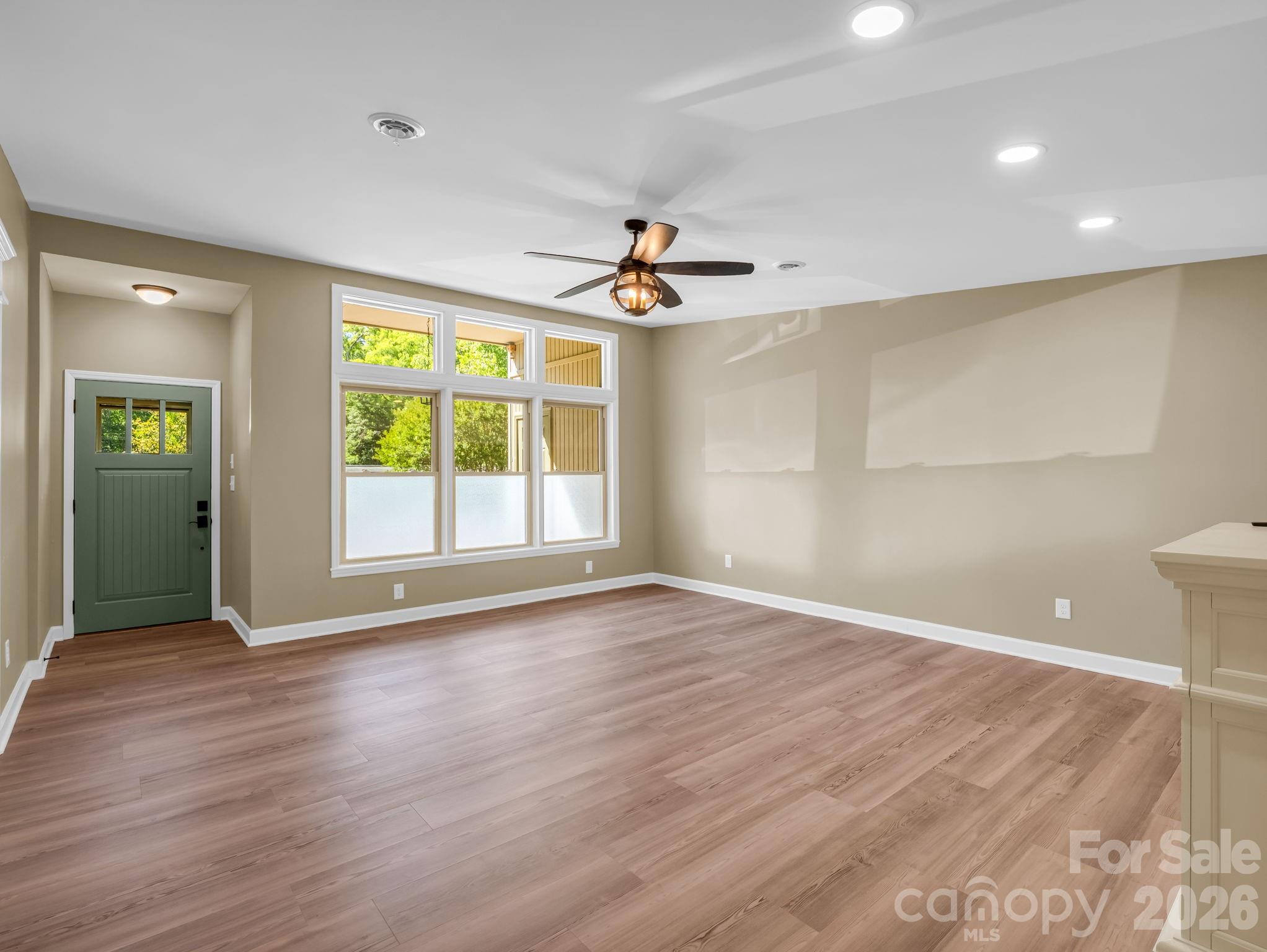 44 Jervey Road, Unit 4C Tryon, NC 28782 - Photo 12 of 35 wooden floor in an empty room with a window