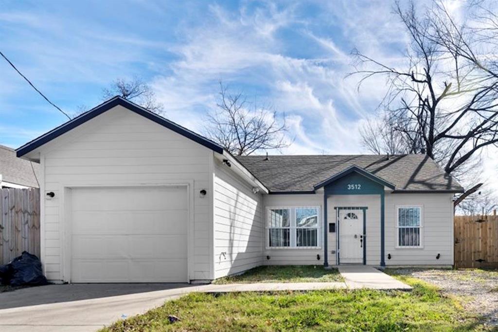 Ranch-style house with driveway, an attached garage, and roof with shingles