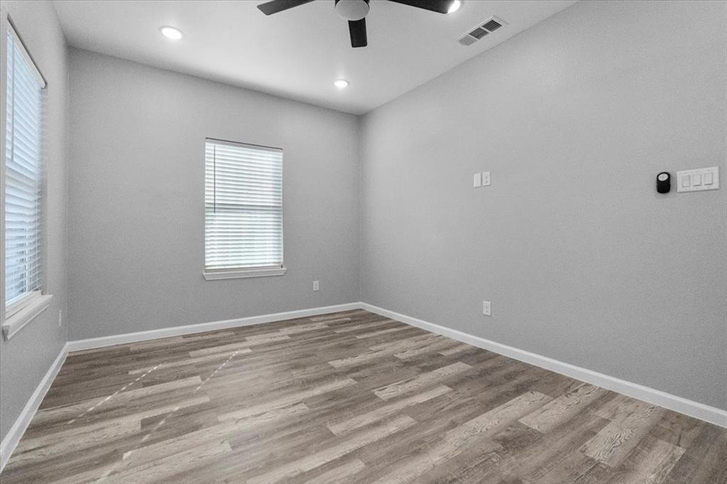 3512 Hamilton Avenue Dallas, TX 75210 - Photo 15 of 23 Empty room with light wood-style flooring, recessed lighting, and a ceiling fan