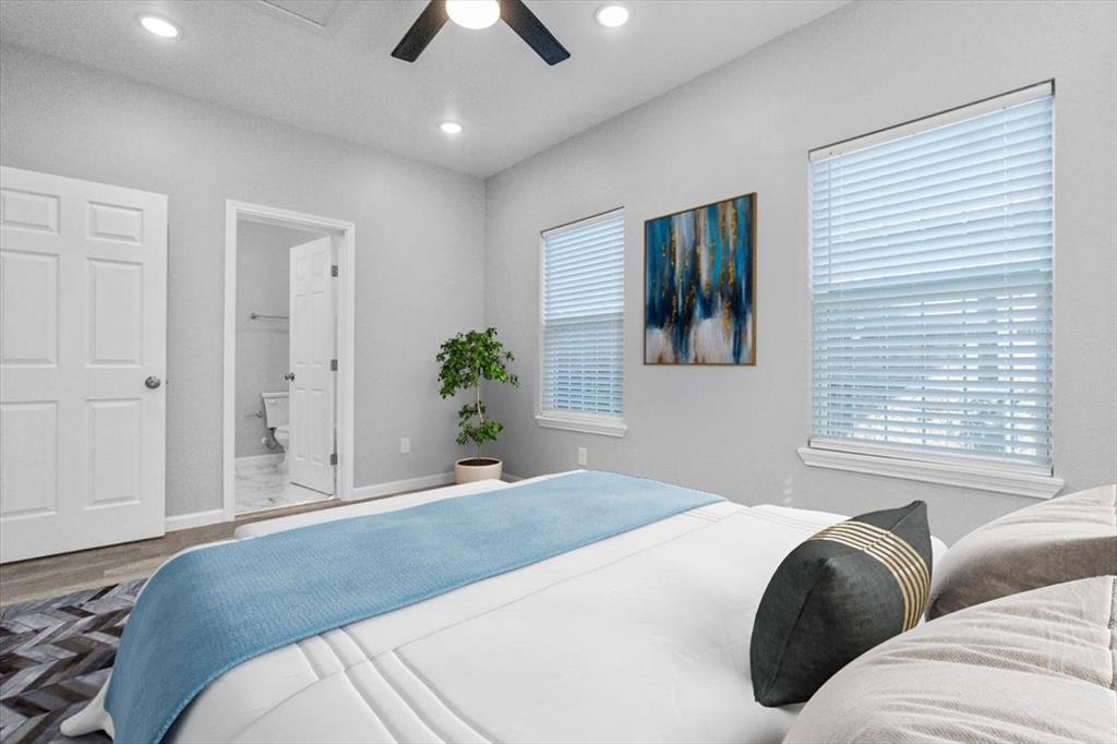 3512 Hamilton Avenue Dallas, TX 75210 - Photo 18 of 23 Bedroom featuring a ceiling fan, wood finished floors, recessed lighting, and connected bathroom
