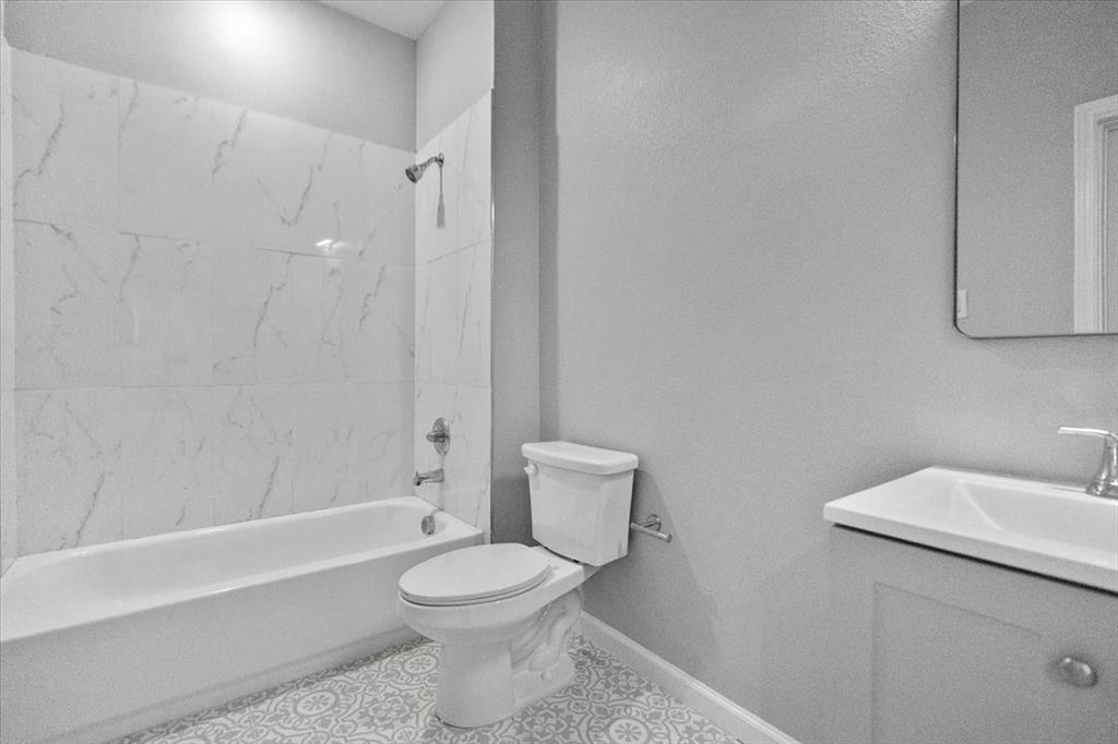 3512 Hamilton Avenue Dallas, TX 75210 - Photo 23 of 23 Full bath featuring vanity and bathing tub / shower combination