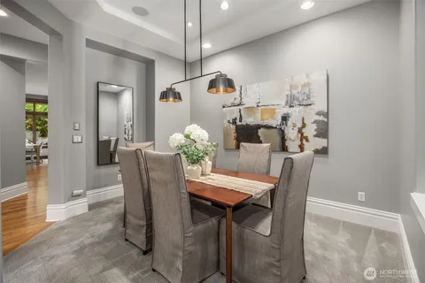 a view of a dining room with furniture