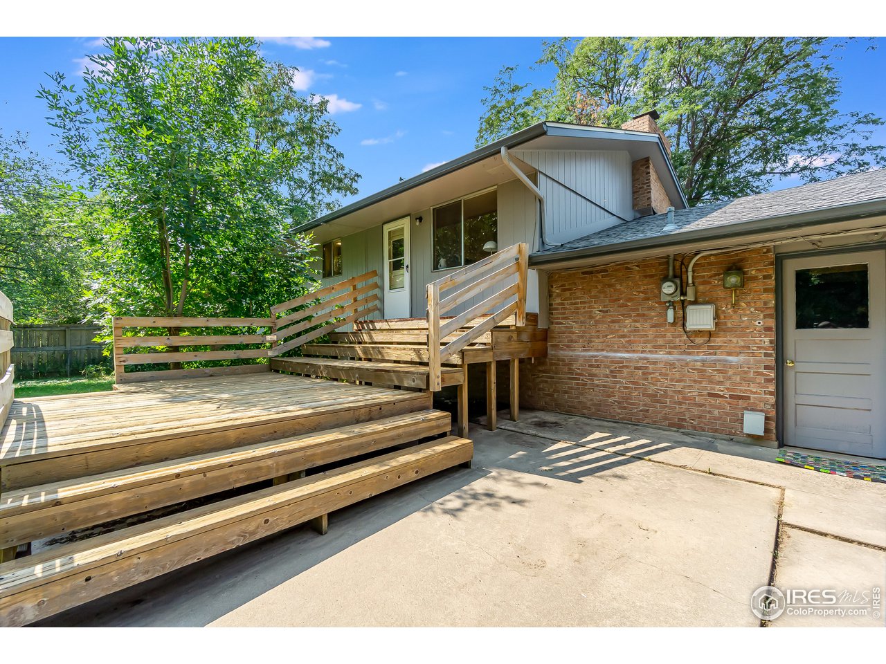2416 Stanford Road Fort Collins, CO 80525 - Photo 33 of 36 Perfect backyard and deck for entertaining