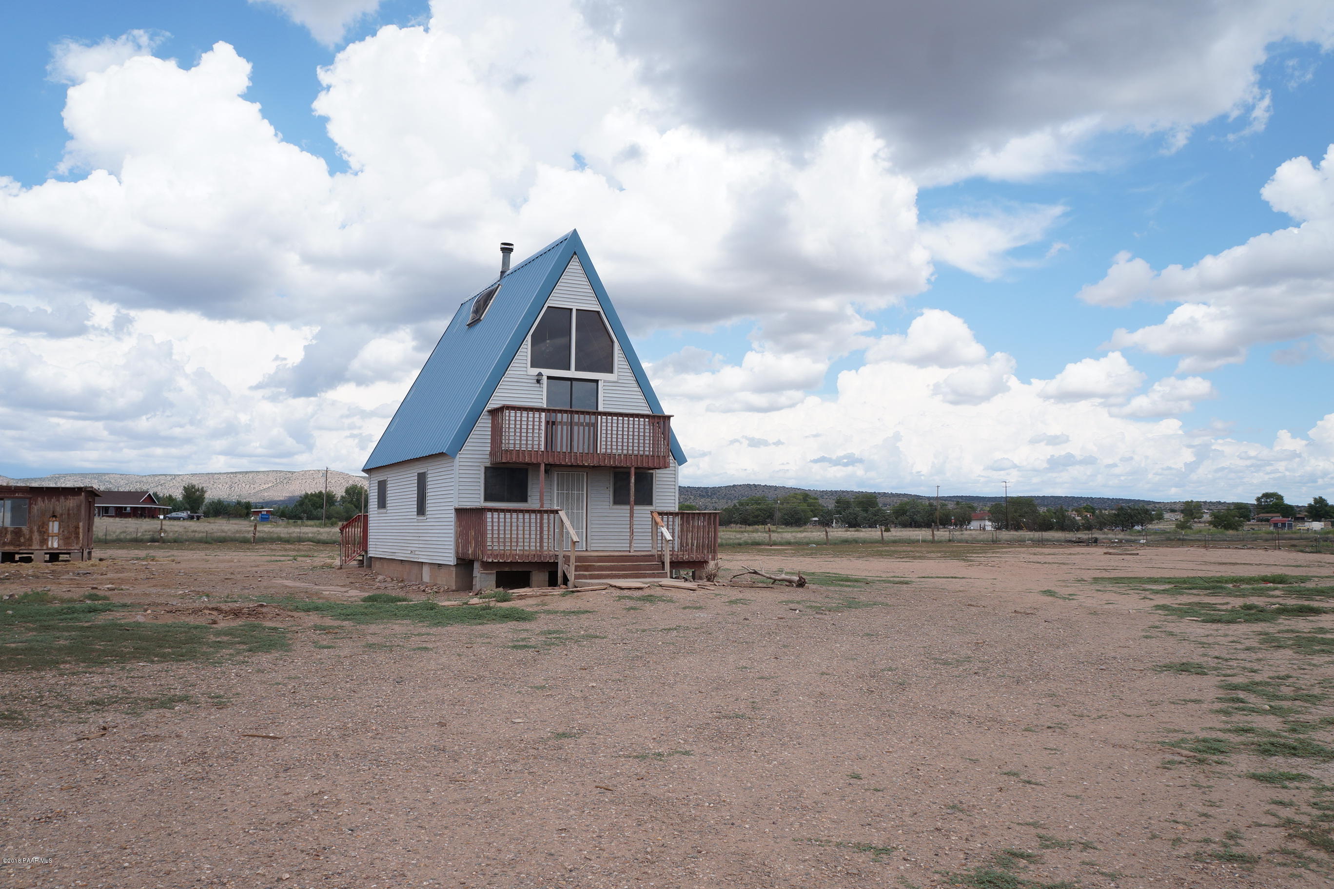 600 Ranch House Road Paulden, AZ 86334 - Photo 1 of 15 a view of a house with a yard