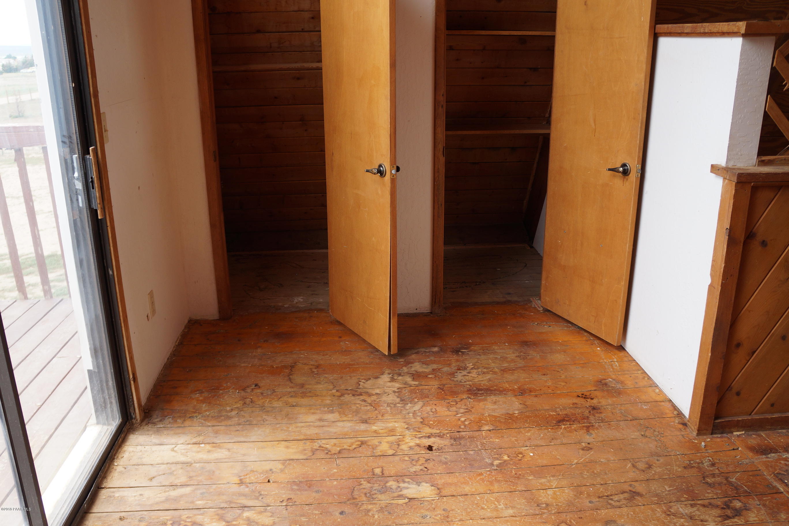 600 Ranch House Road Paulden, AZ 86334 - Photo 13 of 15 a view of livingroom with hallway and wooden floor