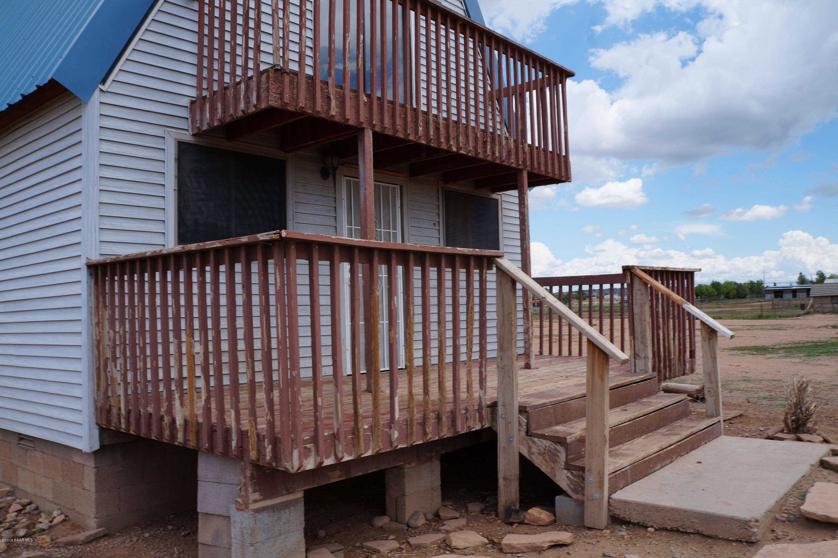 600 Ranch House Road Paulden, AZ 86334 - Photo 4 of 15 a view of a house with wooden deck