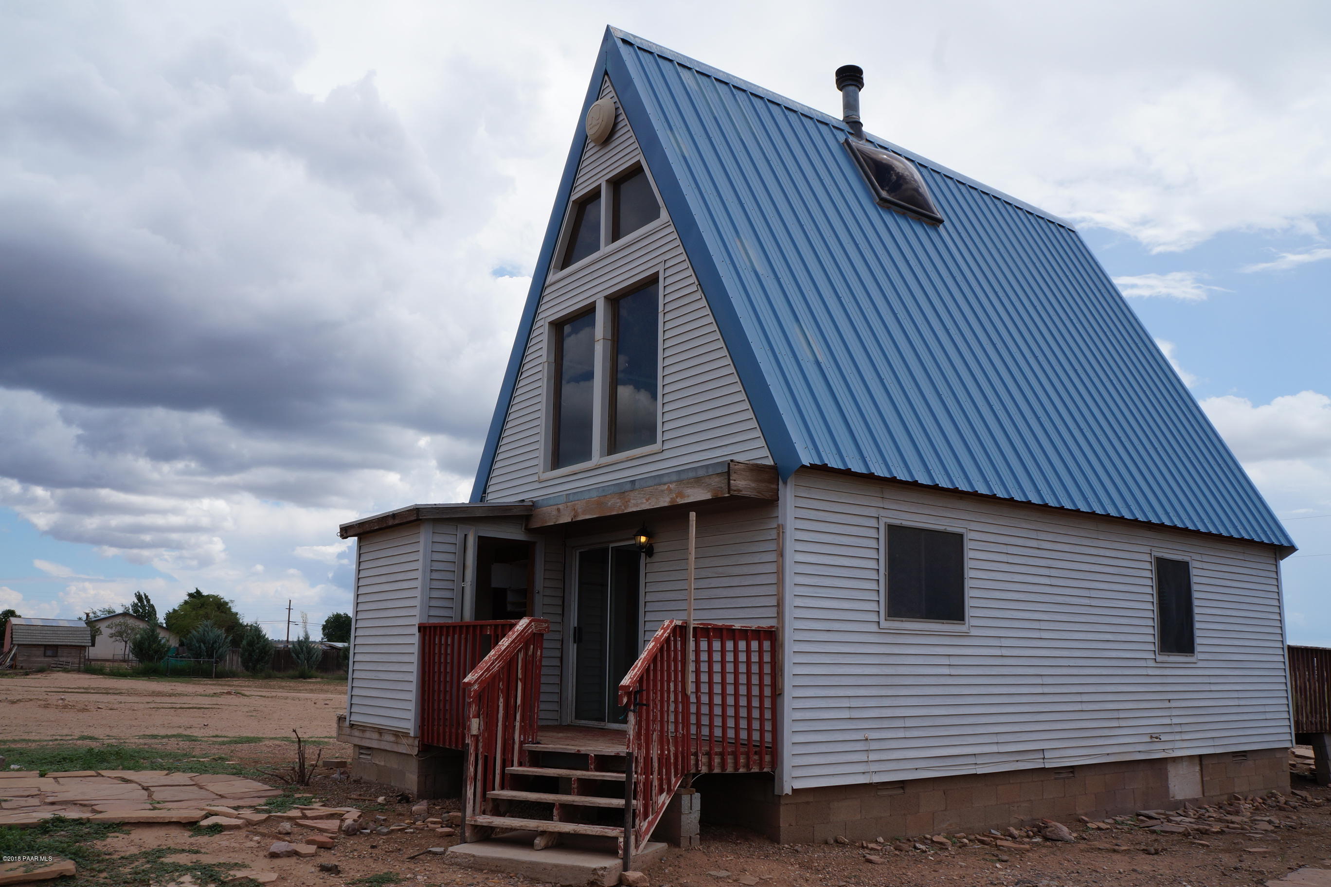 600 Ranch House Road Paulden, AZ 86334 - Photo 5 of 15 a front view of a house with garden