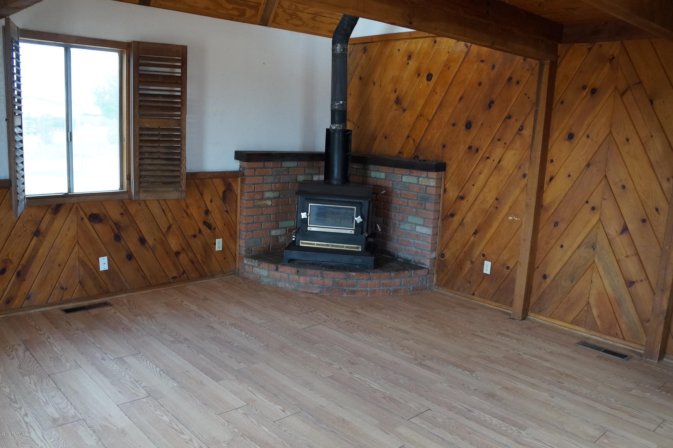 600 Ranch House Road Paulden, AZ 86334 - Photo 6 of 15 a view of a room with wooden floor and a window
