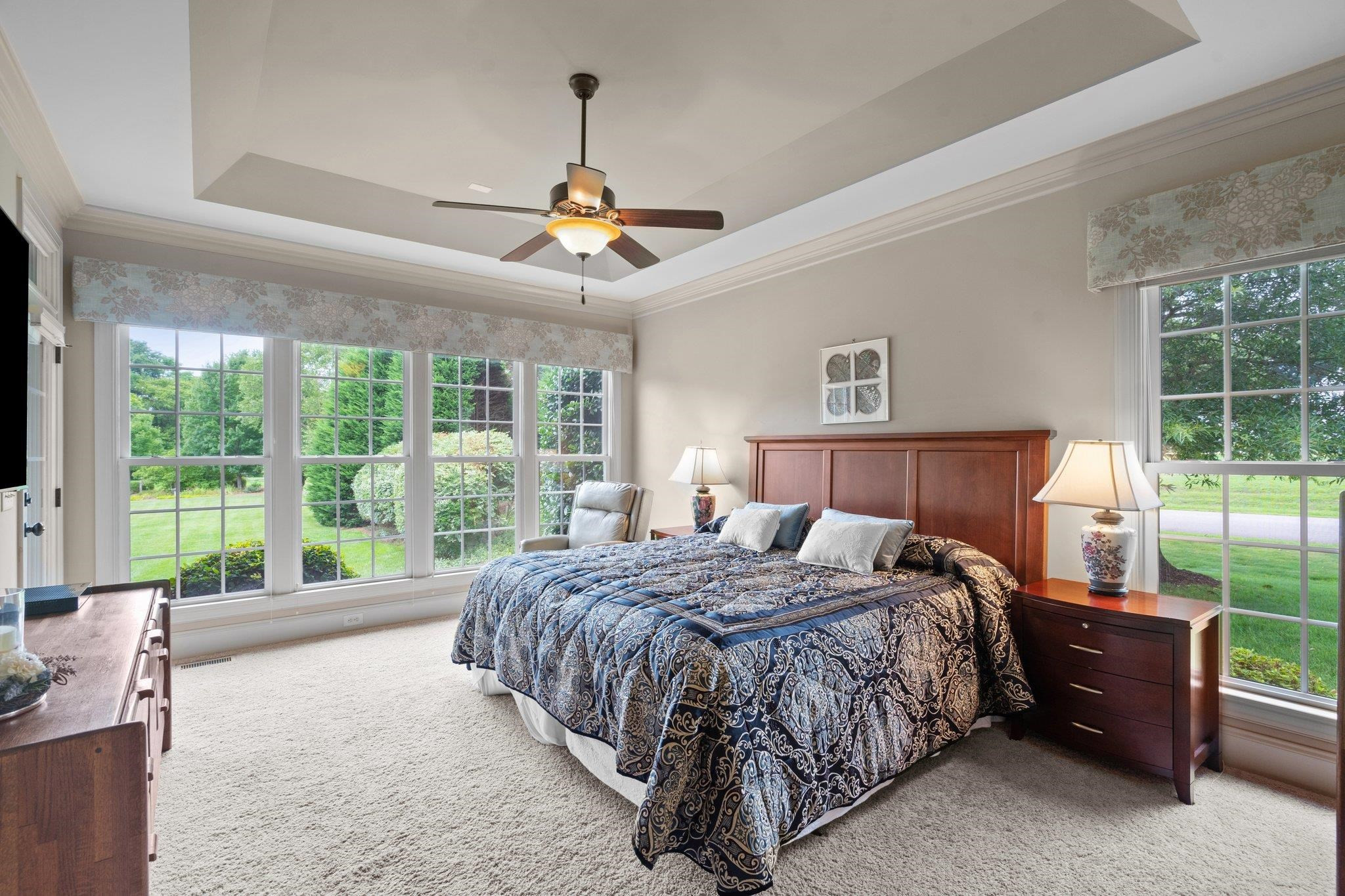 5805 Clovis Ridge Drive Wake Forest, NC 27587 - Photo 19 of 64 a bedroom with a bed and a large window