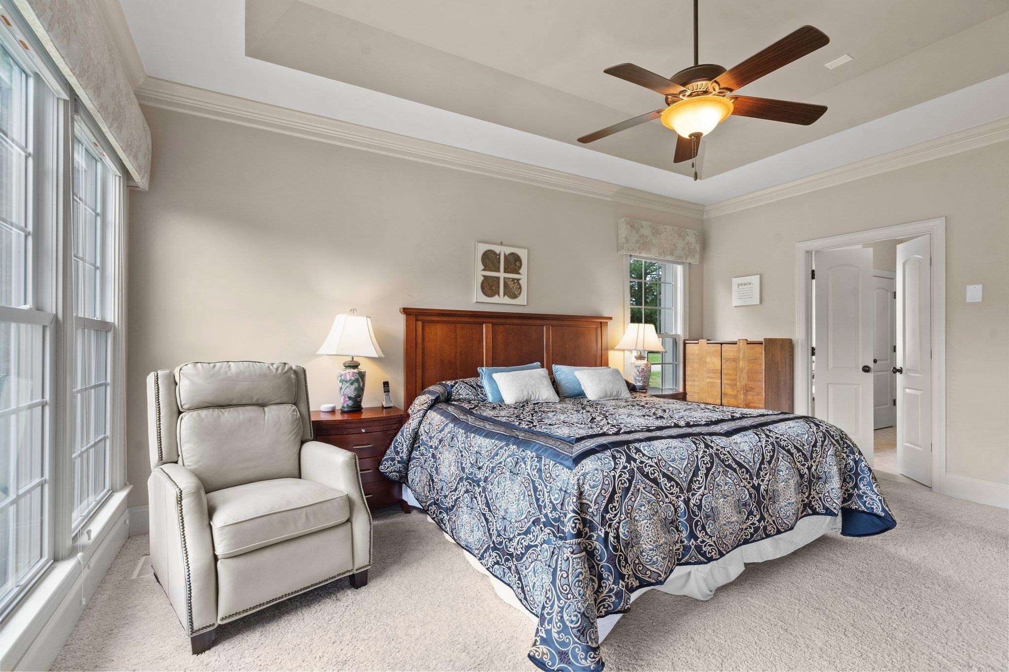 5805 Clovis Ridge Drive Wake Forest, NC 27587 - Photo 20 of 64 a bedroom with a bed and a couch
