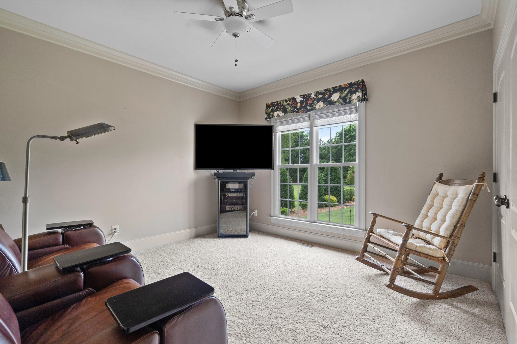5805 Clovis Ridge Drive Wake Forest, NC 27587 - Photo 27 of 64 a living room with furniture and a flat screen tv
