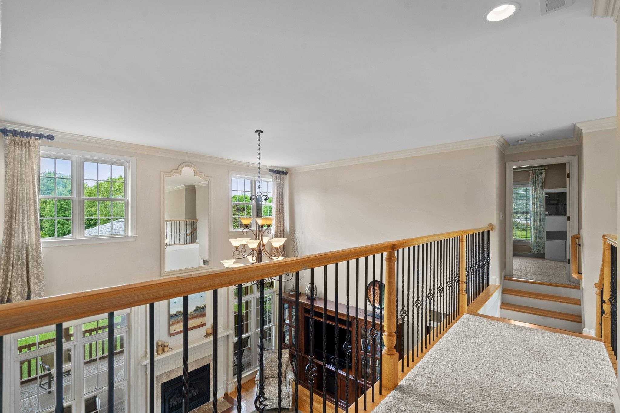 5805 Clovis Ridge Drive Wake Forest, NC 27587 - Photo 33 of 64 a view of a porch with wooden floor and windows