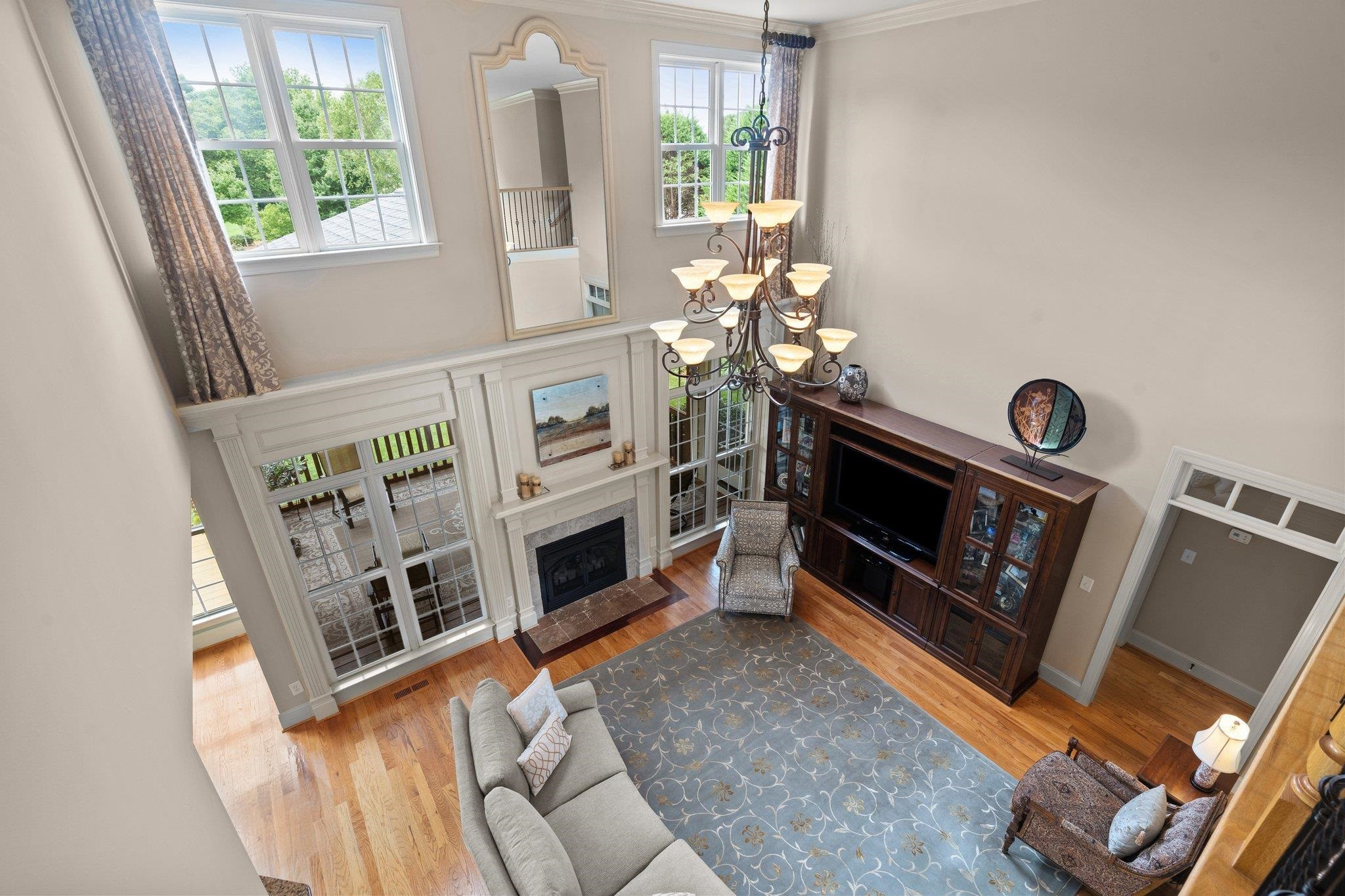 5805 Clovis Ridge Drive Wake Forest, NC 27587 - Photo 34 of 64 a living room with furniture and a fireplace