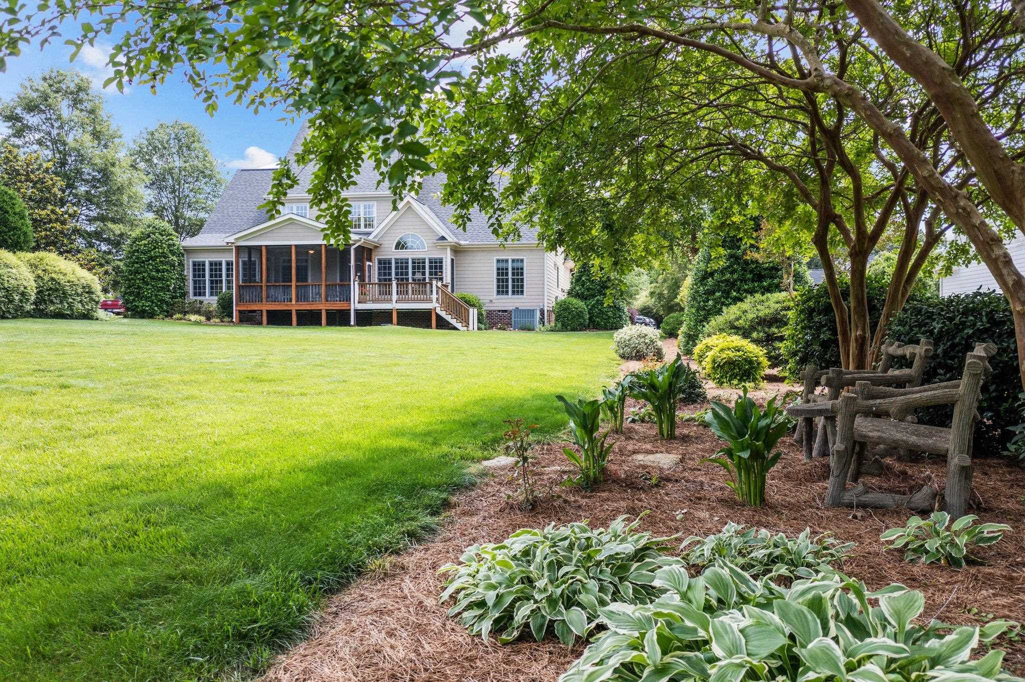 5805 Clovis Ridge Drive Wake Forest, NC 27587 - Photo 38 of 64 a view of a house with a yard
