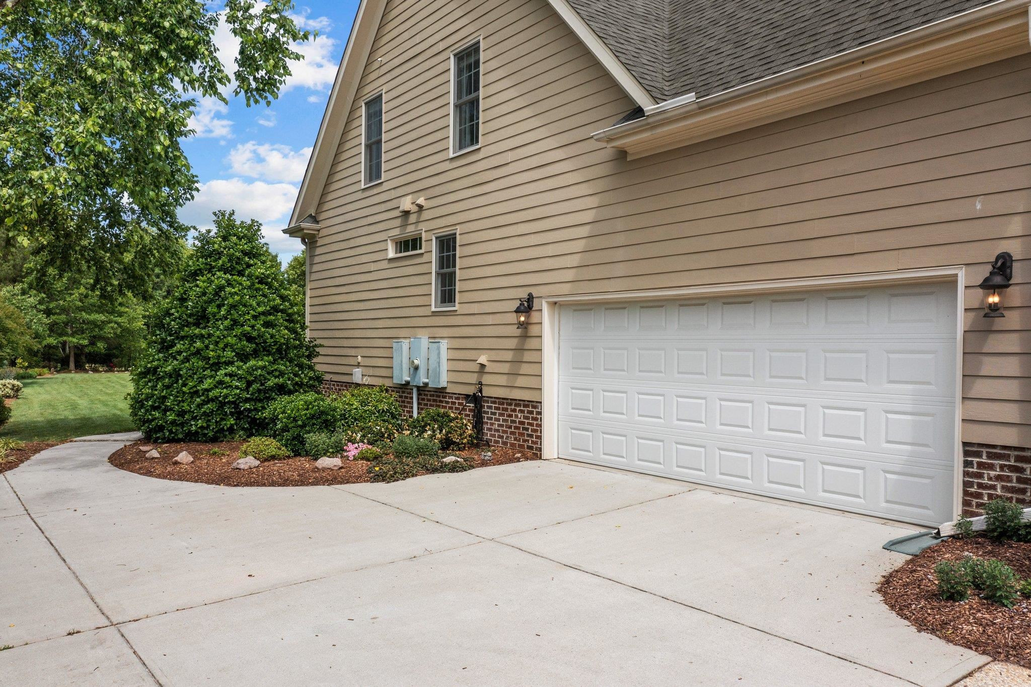 5805 Clovis Ridge Drive Wake Forest, NC 27587 - Photo 52 of 64 a front view of a house