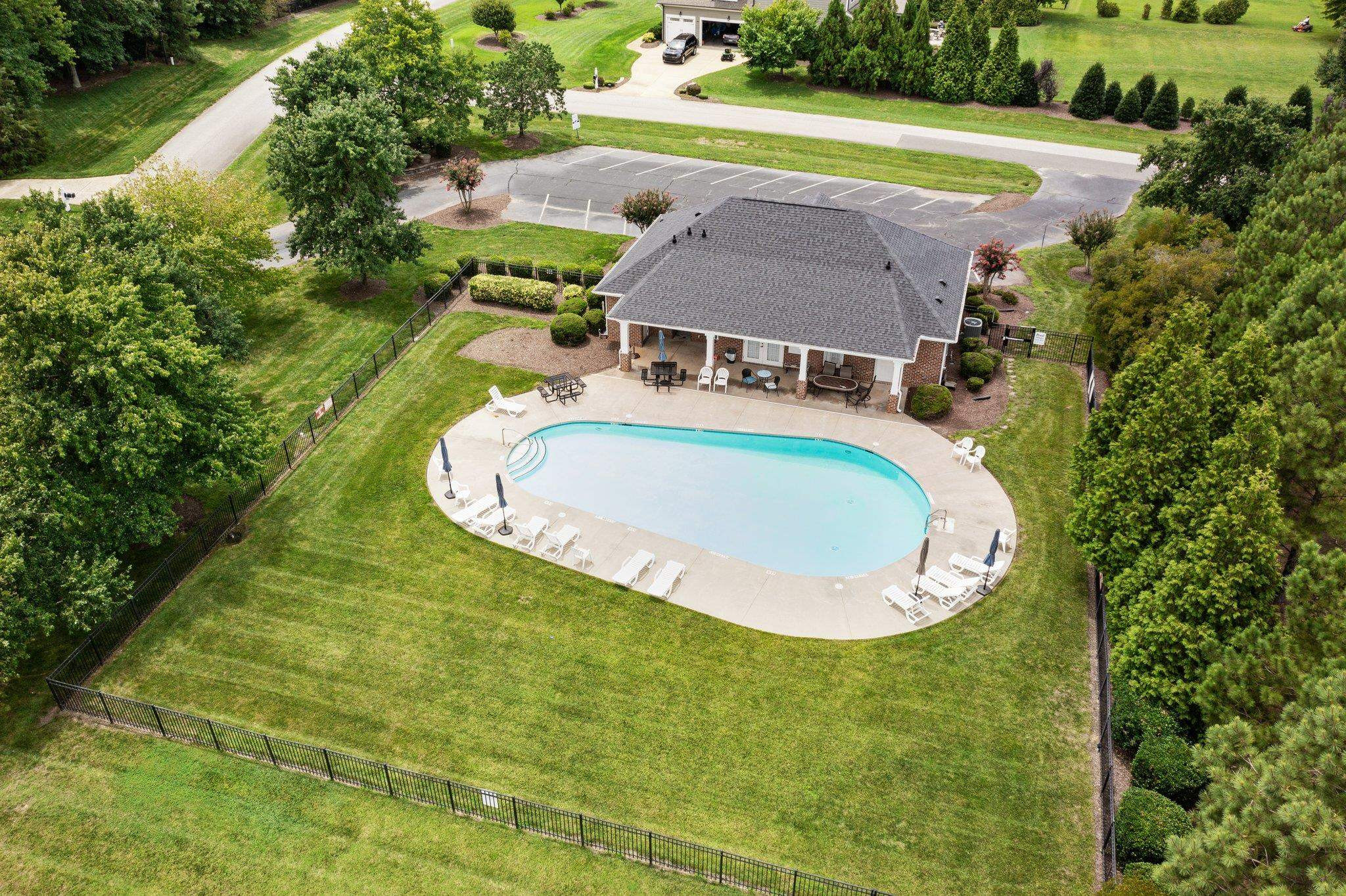 5805 Clovis Ridge Drive Wake Forest, NC 27587 - Photo 61 of 64 an aerial view of a house with a swimming pool