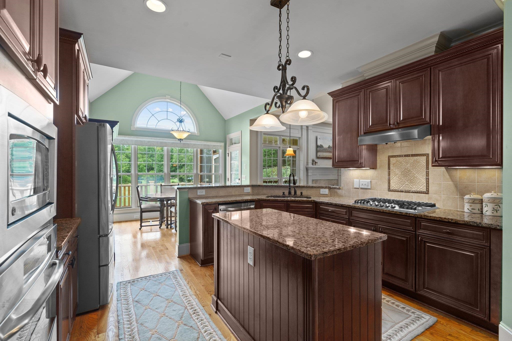 5805 Clovis Ridge Drive Wake Forest, NC 27587 - Photo 8 of 64 a kitchen with stainless steel appliances granite countertop counter space a sink and cabinets