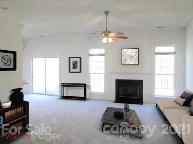 1941 Decatur Court Charlotte, NC 28213 - Photo 2 of 9 a bedroom with furniture and a fireplace