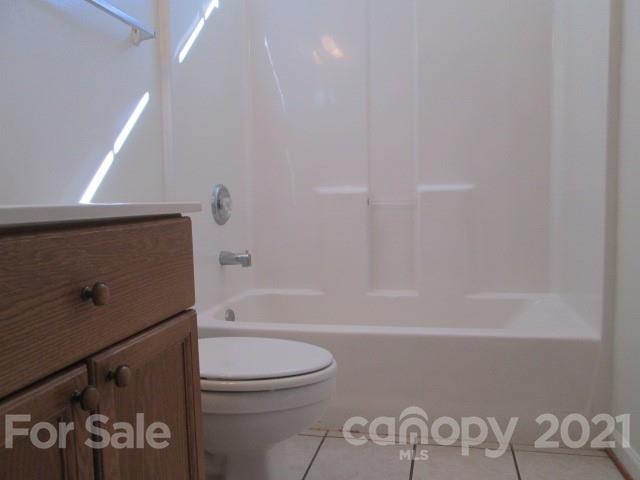 1941 Decatur Court Charlotte, NC 28213 - Photo 9 of 9 a bathroom with a toilet and a shower