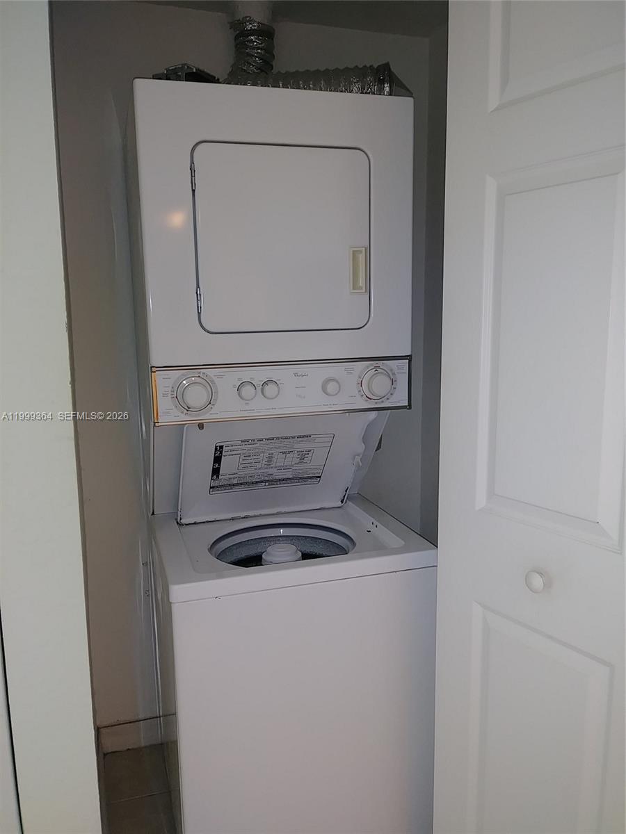 816 Northwest 11th Street, Unit 1002 Miami, FL 33136 - Photo 12 of 19 a close view of washer and dryer