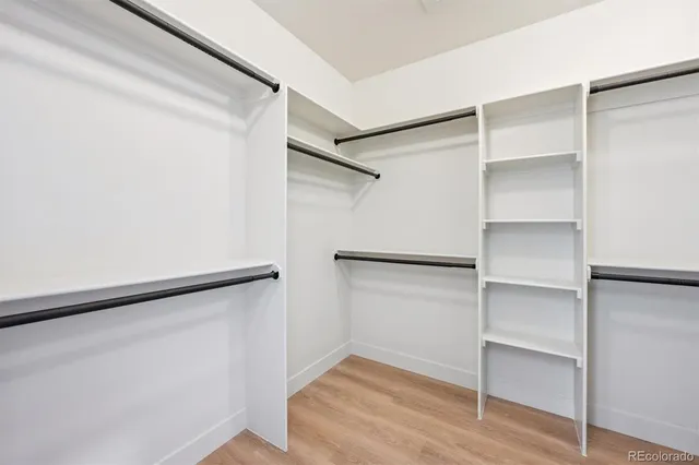 a view of an empty walk in closet