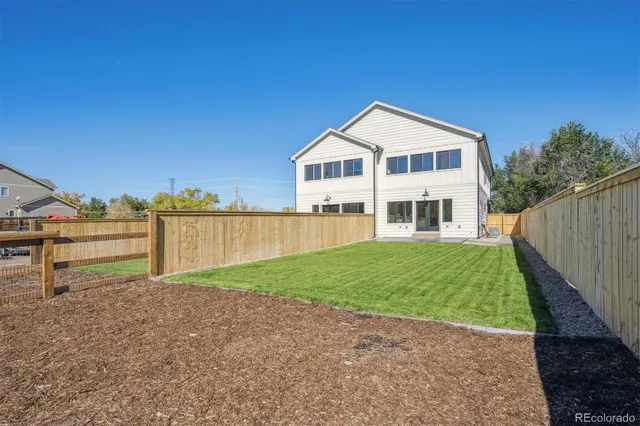 a house view with a garden space