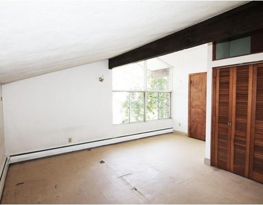 16 Foster Road Lexington, MA 02421 - Photo 18 of 21 an empty room with windows