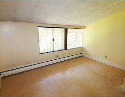 16 Foster Road Lexington, MA 02421 - Photo 19 of 21 an empty room with a empty space and a window