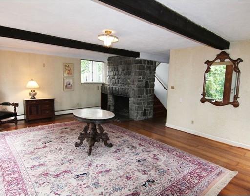16 Foster Road Lexington, MA 02421 - Photo 4 of 21 a room with furniture and a fireplace