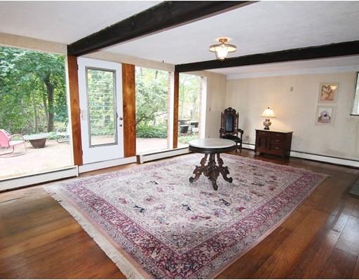 16 Foster Road Lexington, MA 02421 - Photo 6 of 21 a living room filled with furniture and a rug
